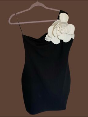 One-Shoulder Black Mini Dress with White Floral Accent